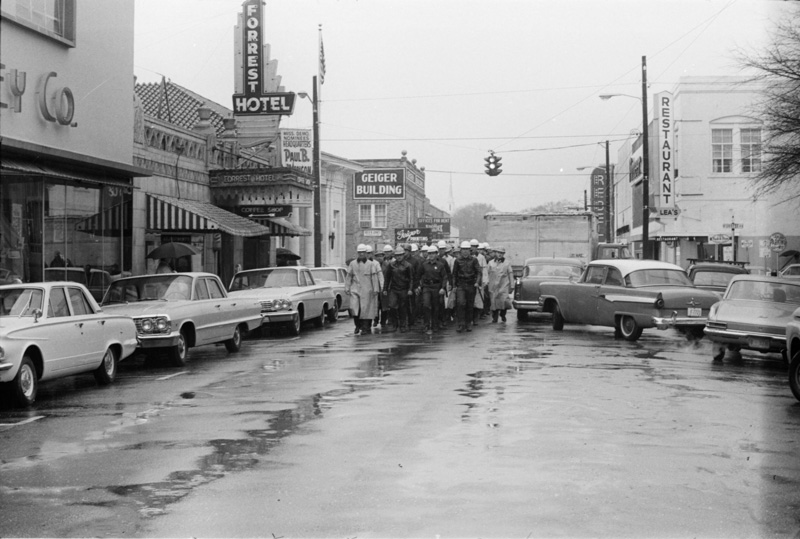 A Riot squad marches down Pine Street to the Hattiesburg courthouse 0n January 22, 1964. 