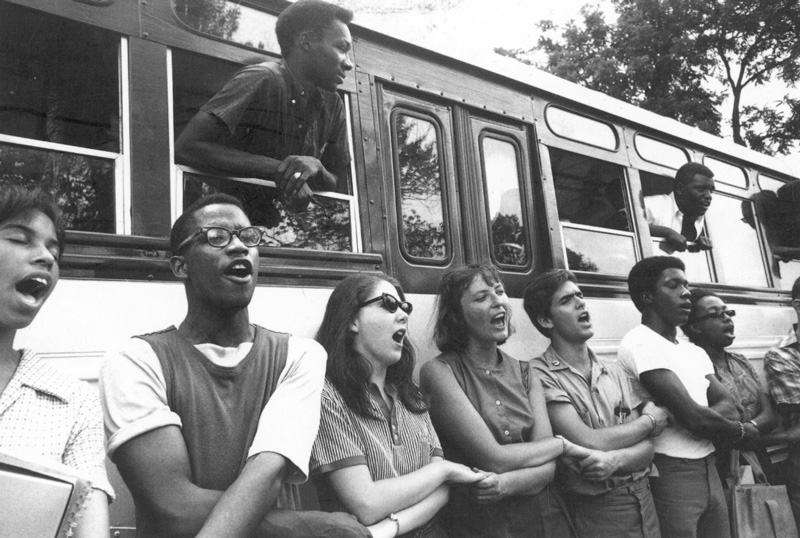Freedom summer volunteers singing “We Shall Overcome,” the anthem of the Civil Rights Movement on June 19, 1964. 